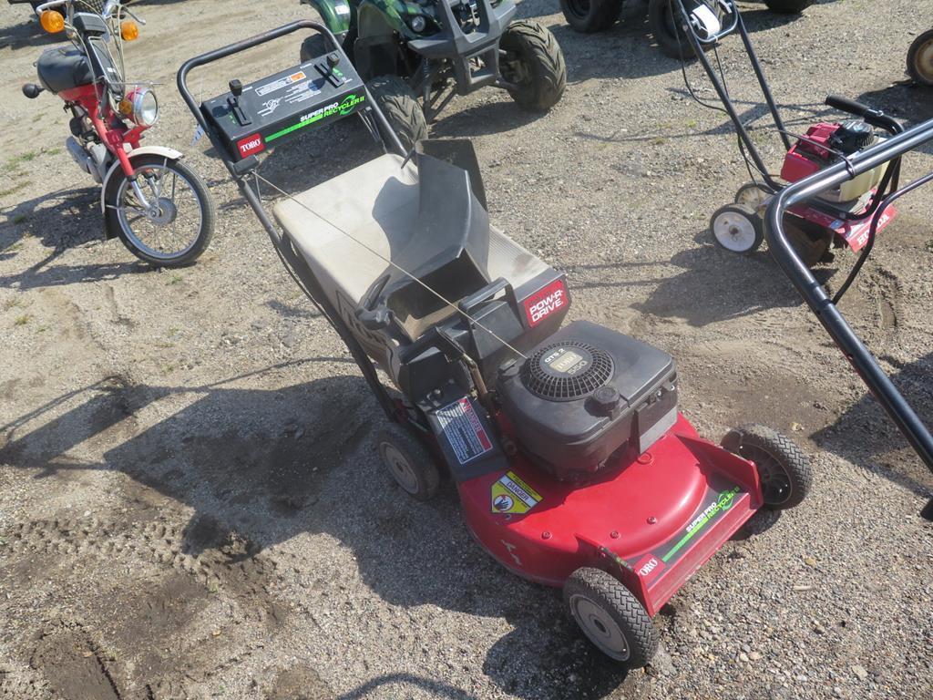 Toro self propelled lawn mower with bagger - runs~1196