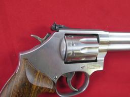 Smith & Wesson 617-6 .22LR 10 shot double/single action revolver, wood grip