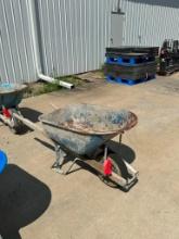 Jackson 6 cubic ft steel wheelbarrow with wood handle, located in Mt. Pleasant, IA.