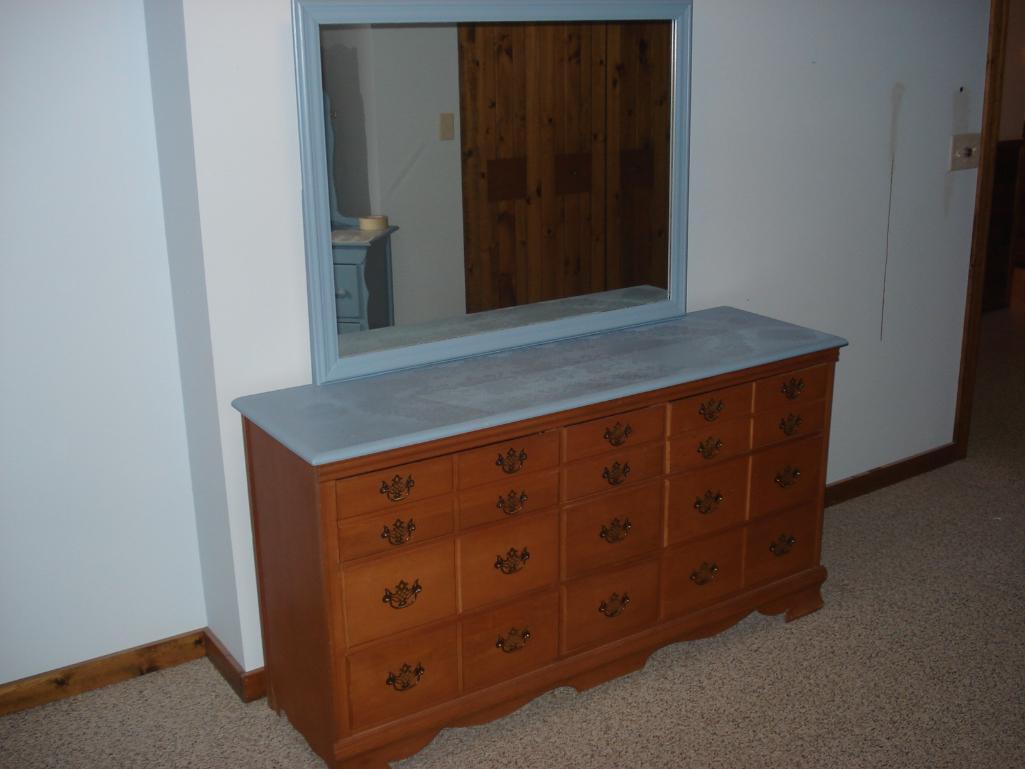 Dresser with attached mirror