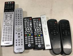 LOT CONSISTING OF: (2) DVD MOVIES, (2) CD'S AND ASSORTED REMOTE CONTROLLERS