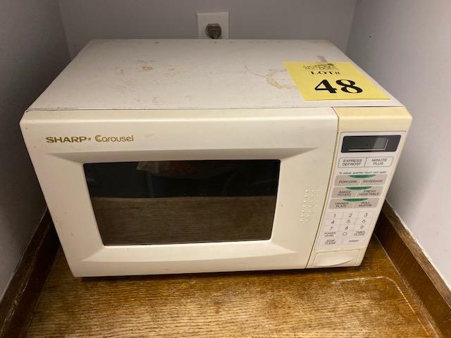 SHARP MICROWAVE OVEN AND SUB ZERO REFRIGERATOR