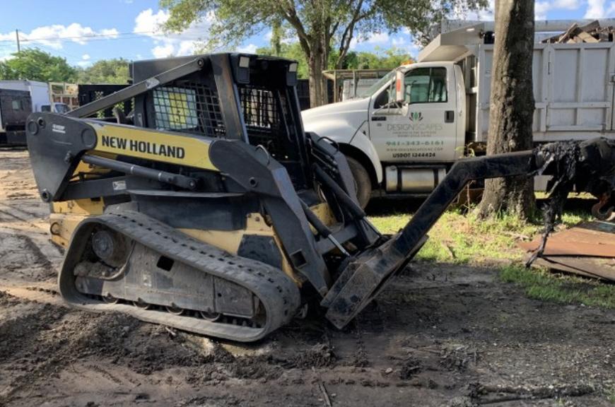 NEW HOLLAND C190 SKID STEER WITH BOOM ATTACHMENT