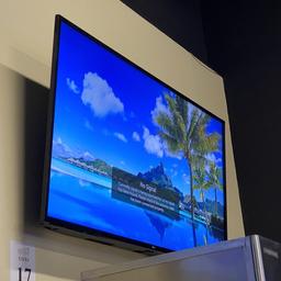 LG 55" TV WITH WALL MOUNTING BRACKET