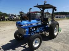 Ford 2810 Farm Tractor, 2 post canopy, 13.6-28 turf tires on rear, power steering, rear lift arms, P