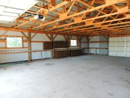 Approximatley a 2002 Steel Pole Building 32x48 in size.  Two overhead doors