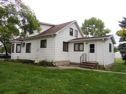 Lot 5: 424 4th ST SE.  25x36 House with a 14x15 entry addition and metal si