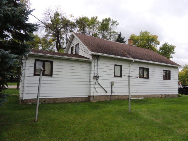 Lot 5: 424 4th ST SE.  25x36 House with a 14x15 entry addition and metal si