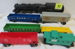 Lionel Train O-Scale Grouping Inc. Steam Locomotive #1110, Tender and (6) Train Cars