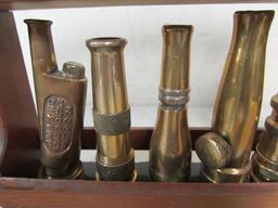 Excellent Collection Of Antique Brass Hose Nozzles In Display.