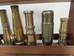 Excellent Collection Of Antique Brass Hose Nozzles In Display.