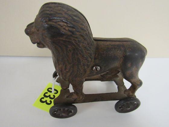 Antique AC Williams Lion on Wheels Cast Iron Coin Bank