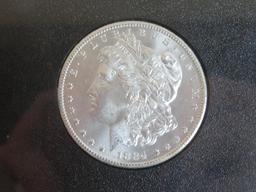 1884 CC Uncirculated Morgan Silver Dollar NGC Graded GSA Hoard MS 64