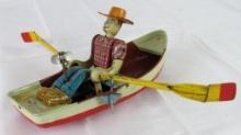 Antique Japan Tin Wind-Up Man in Row Boat Toy