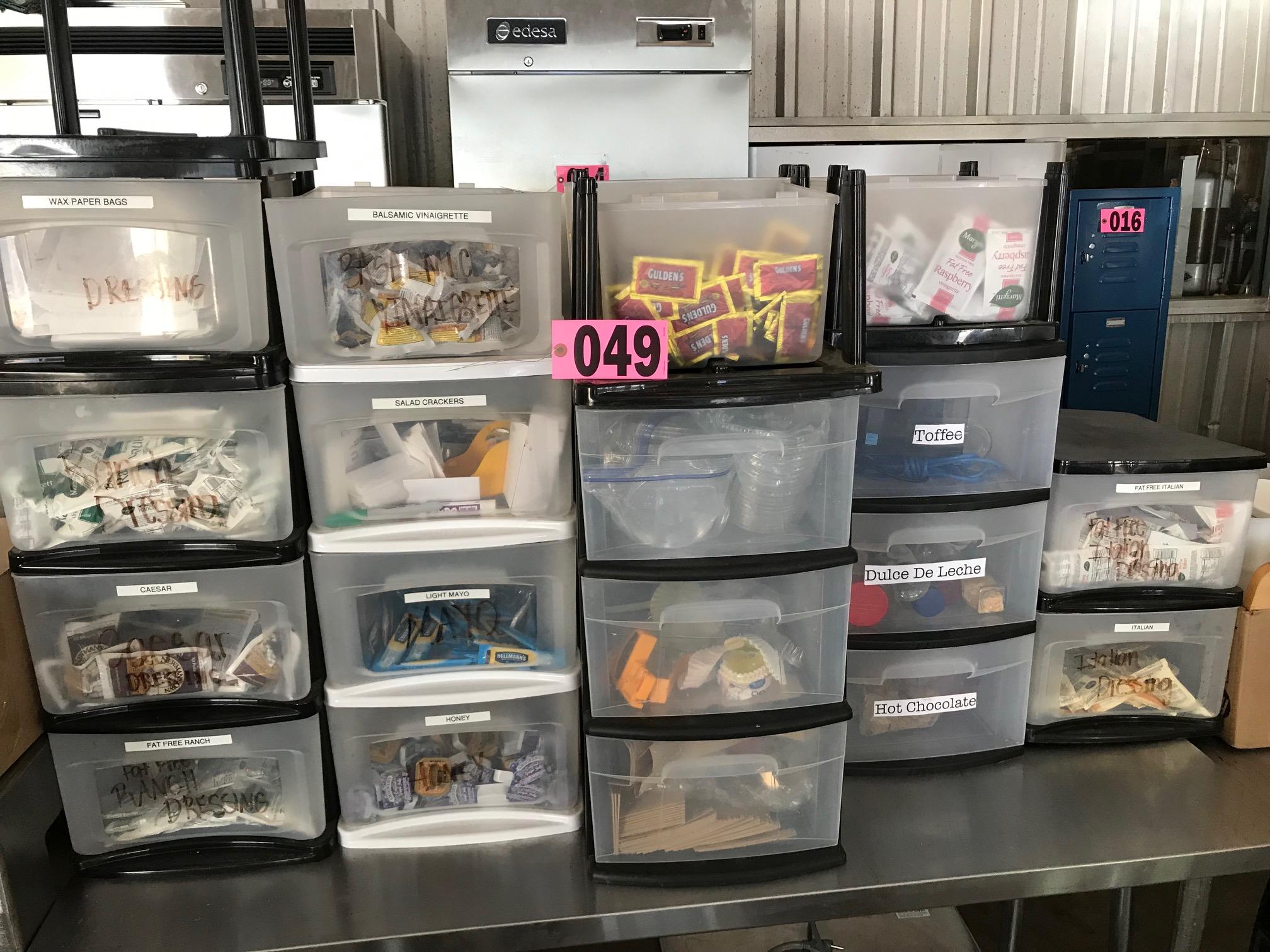 Plastic storage bins of condiments