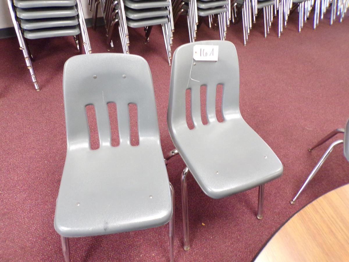 (9)  Gray plastic school desk chairs