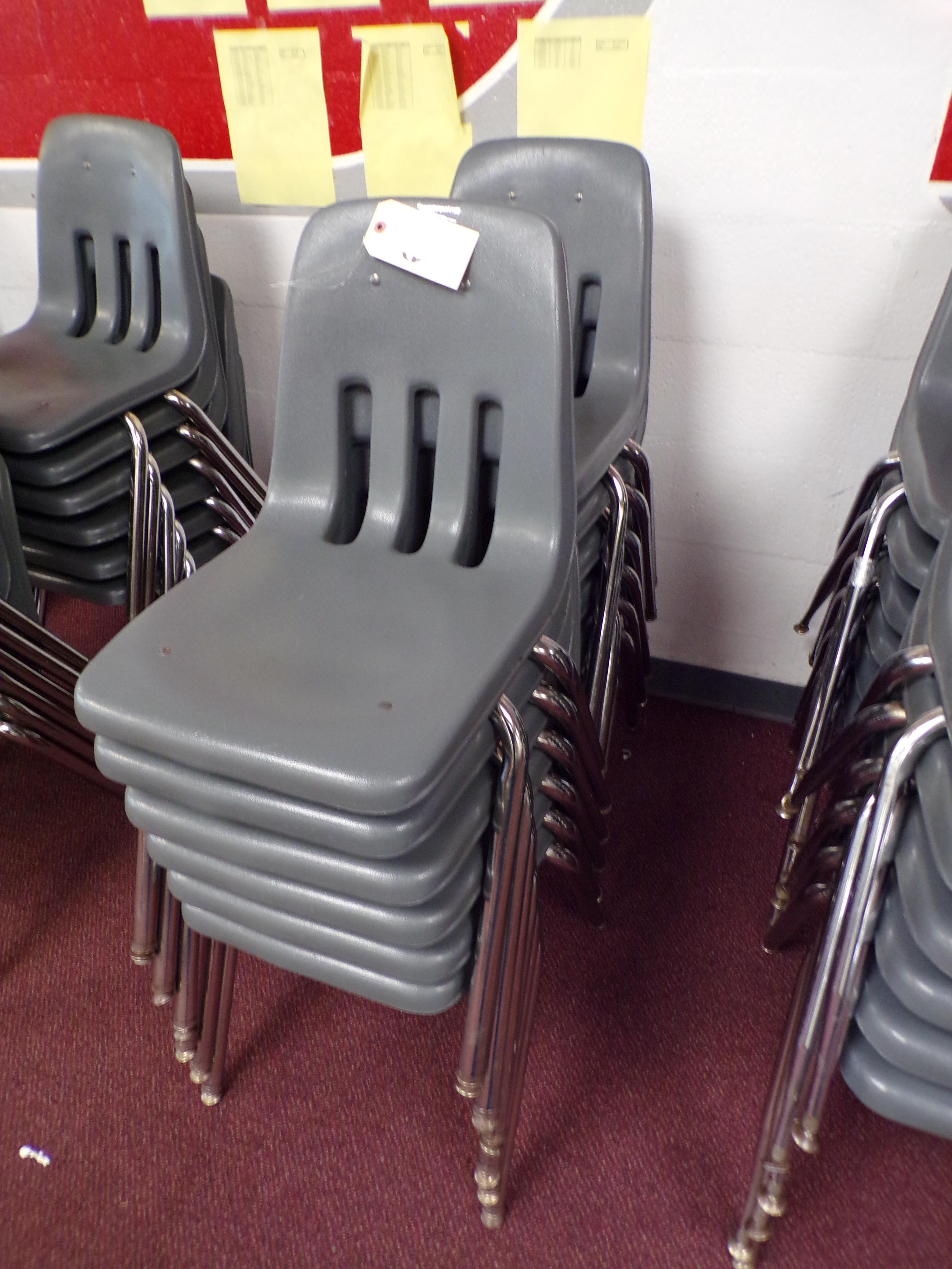 (12) Gray plastic school desk chairs