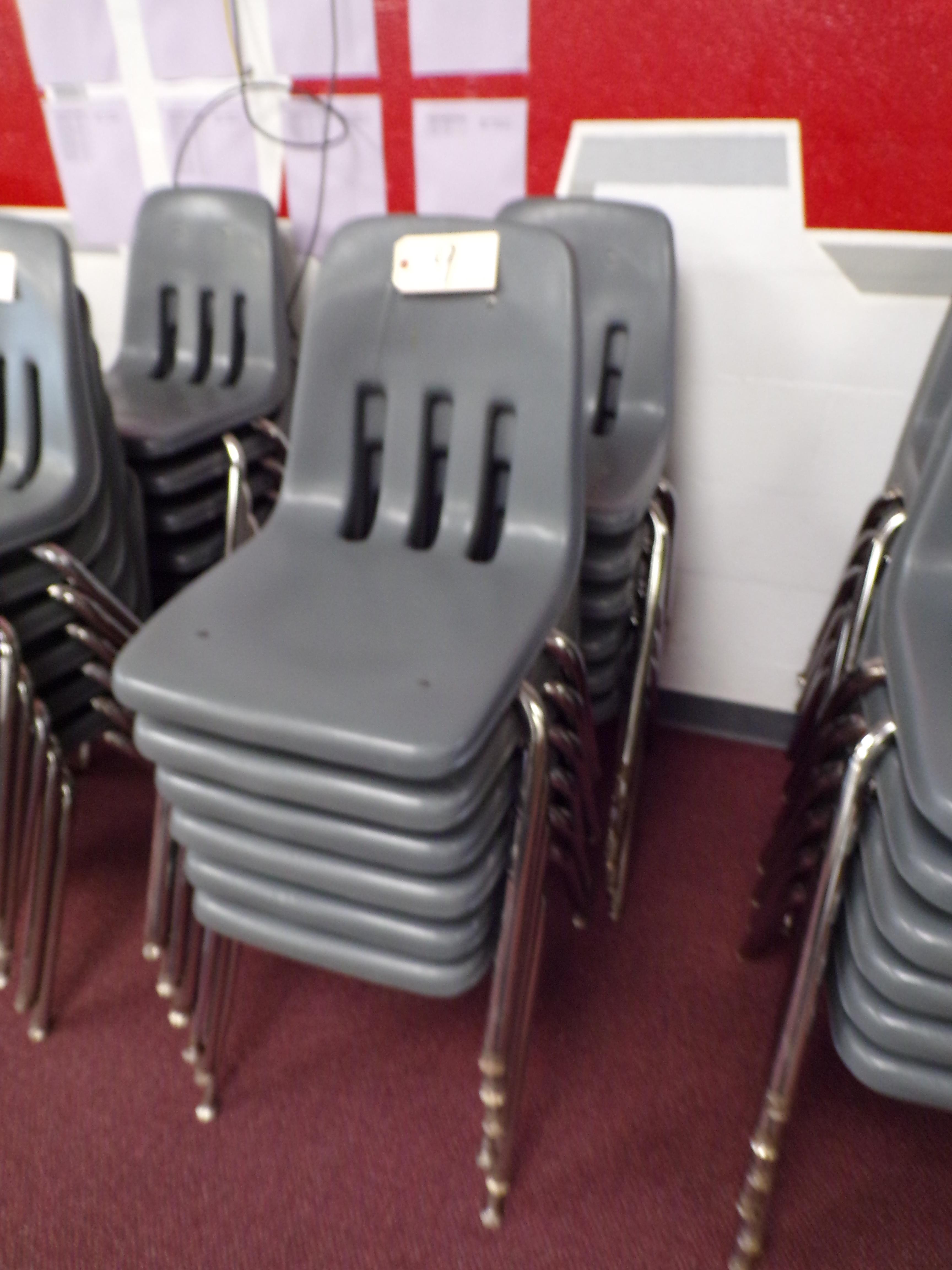 (12) Gray plastic school desk chairs