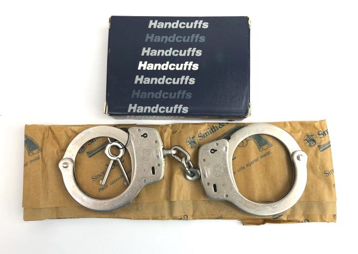 S&W MODEL 100 NICKEL HANDCUFFS WITH 2 KEYS