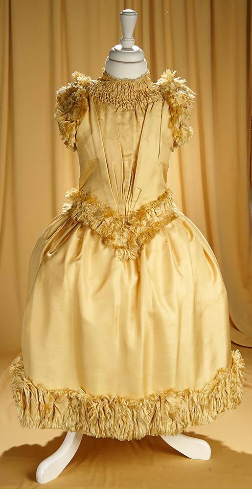 19th century gold silk faille child's dress with elaborate construction. $300/500