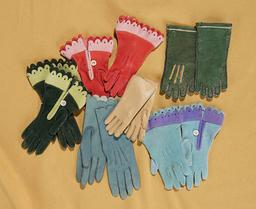 Six pairs of miniature antique kid leather gloves for poupees. $400/500