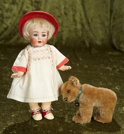 10" German bisque character, 126, with wonderful toddler body in great condition. $400/600