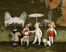 Group, 1"-2" German all-bisque tiny dolls and set of metal filigree furnishings. $300/400