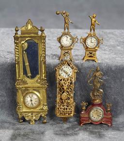 5" largest clock. Five antique dollhouse clocks in various styles. $400/600