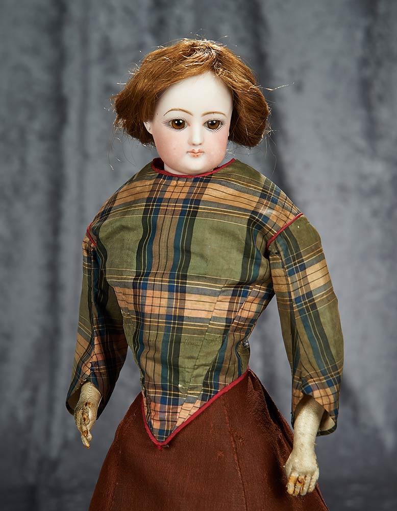 17" French bisque poupee by Gaultier with rare amber brown glass eyes. $1100/1300