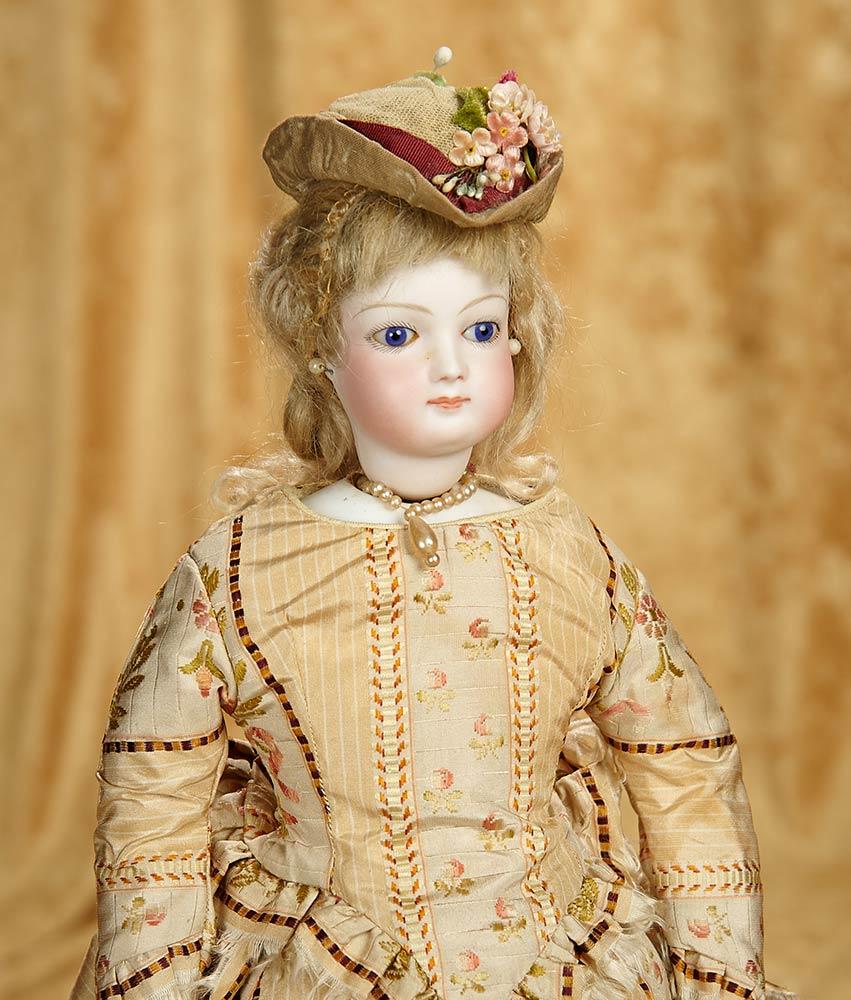 15" Beautiful French bisque poupee by Jumeau in silk brocade gown. $1800/2200