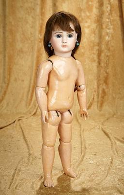 20" French bisque bebe, Figure A, by Jules Steiner with original signed body. $2400/2700