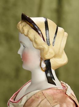 20" German bisque lady with sculpted hair, lustre diadem, brown hair ribbons, earrings. $700/900