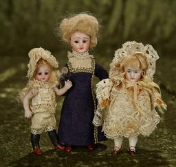 4"-5" Three German all-bisque miniature dolls in original costumes. $500/800