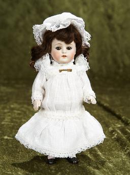 9" German all-bisque miniature doll, model 150, by Kestner with sleep eyes. $500/700