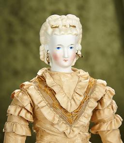17" German bisque lady doll with blonde sculpted hair with gilt hair comb. $700/900
