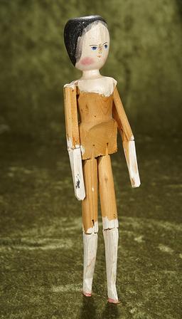 12" Grodnertal wooden doll with original finish. $200/300