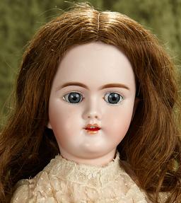 24" German bisque child, model 109, by Handwerck in beautiful original costume. $400/600