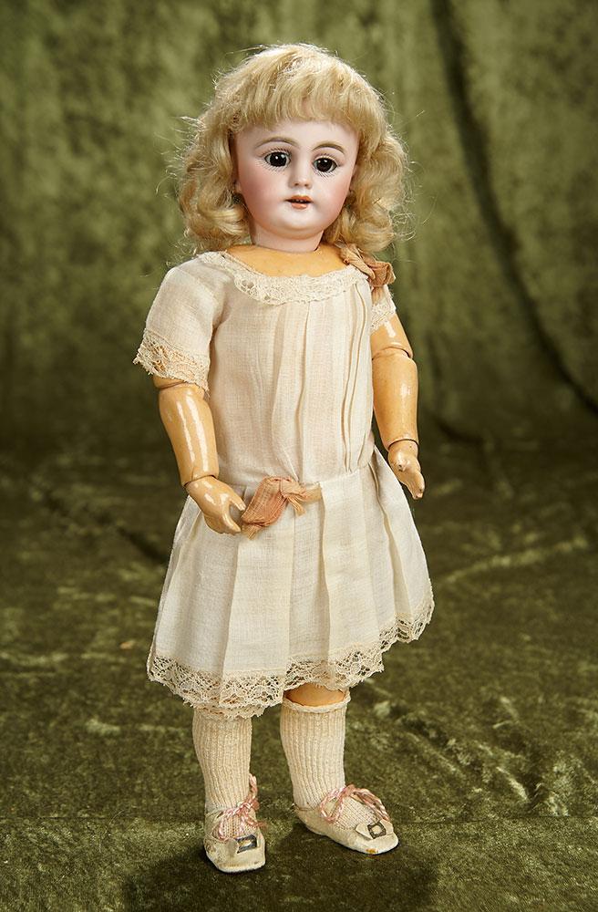 14" German bisque child doll, 1009, by Simon & Halbig with original wig and body. $400/600