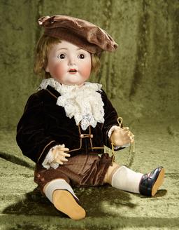 22" German bisque toddler, 1294, by Franz Schmidt with wonderful costume. $500/750