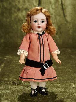 11" German bisque toddler, model 122, by Kammer and Reinhardt. $300/500