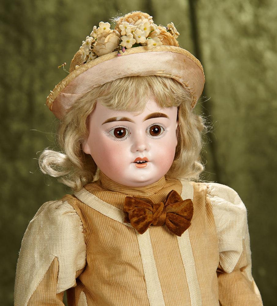 20" German bisque child doll, 1894, by Marseille in wonderful antique costume. $400/500