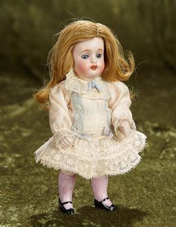7" German all-bisque miniature doll, model 150, by Kestner. $400/500