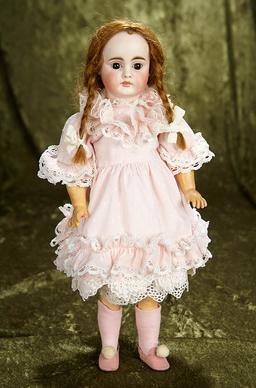 15" Beautiful German bisque closed mouth doll in appealing petite size. $700/900