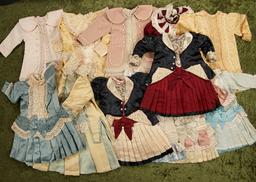 Eleven silk dresses for French bebes or child dolls in the French style of 1880s. $300/400
