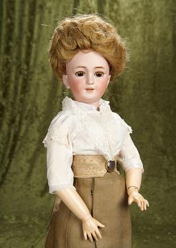25" German bisque doll, model 1159, with shapely lady body for the French market. $1200/1600