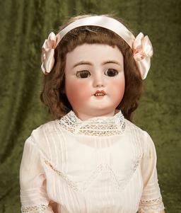 28" German bisque child by Bergmann with pretty antique costume. $500/700