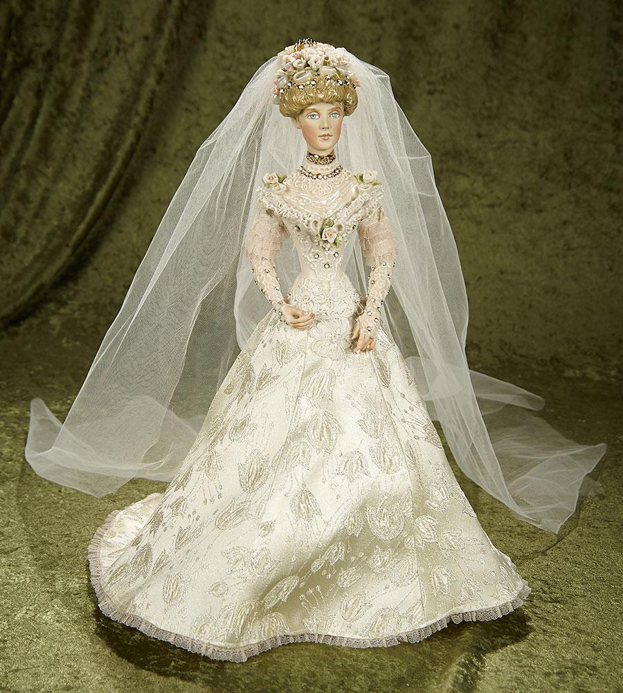 16" Porcelain Bride with elaborate coiffe by Kathy Redmond. $400/500