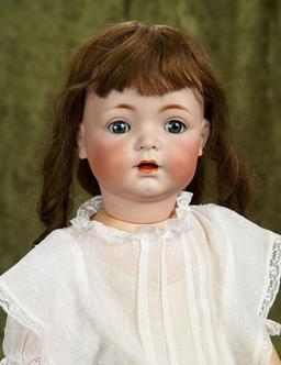 19" German bisque toddler, model 121, by Kammer and Reinhardt, antique costume. $500/700
