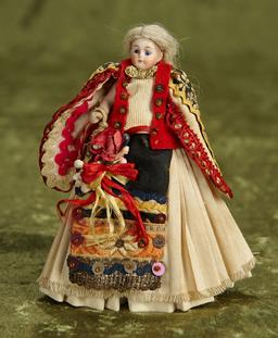 5" German bisque miniature doll with rare elaborate folklore costume. $200/300
