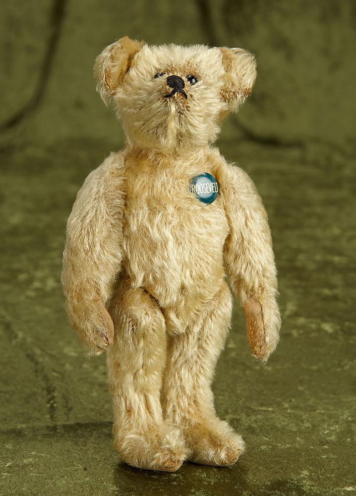 11" Early German mohair teddy bear with black shoe-button eyes, Roosevelt button. $400/500